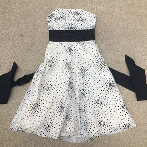 white and black polkadot dress